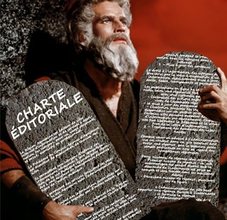 Moïse tient la charte éditoriale gravée sur des tables de la loi